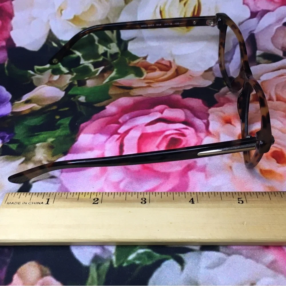 Versace orange & black tortoise frames glasses  Silver medusa face logo corners